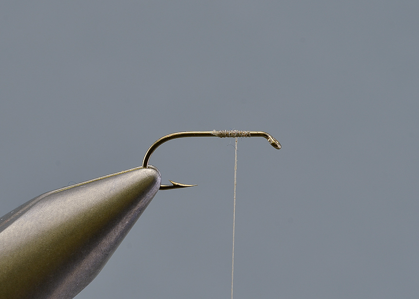 1. Make a thread catch about 1/3 of the way from the eye of the hook, you do not want the wing to far forward as you will need some room for two turns of hackle in front of the wing. These flies were traditionally often tied with a small portion of bare hook shank behind the eye to accommodate a turtle knot and that's how I tie mine, today this is mostly a matter of taste.
